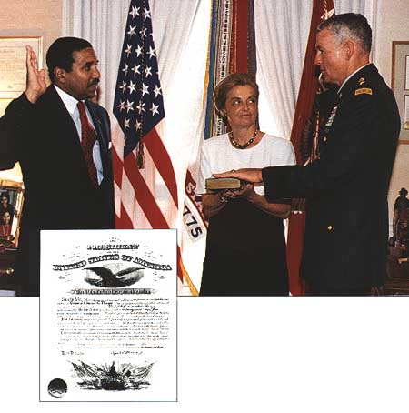 Photo: Secretary of the Army Togo D. West, Jr., with Mrs. Reimer, swears in General Dennis J. Reimer, the new chief of staff, 20 June 1995.