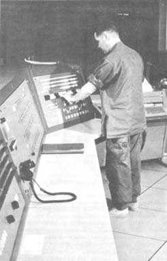Photograph: Checking A Console At Phu Lam Automatic Message Switching Center