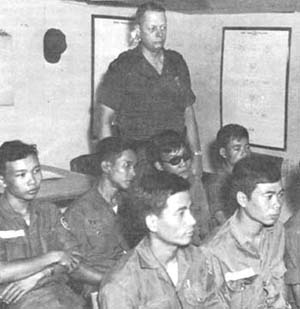 Photograph: General Foster Observing Vietnamese Signal Training Class