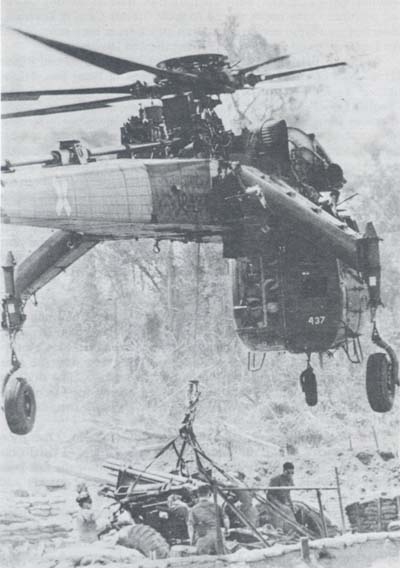 Photograph: CH-54 Emplacing 155-mm. Howitzer