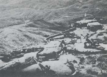 Photograph: Battery A, 2d Battalion, 320th Field Artillery, in position on Operation WHEELER