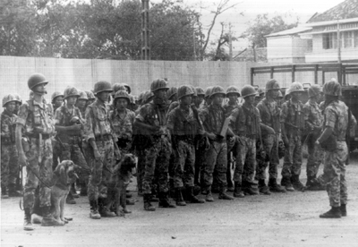 Photo:  POLICE FIELD FORCE FORMATION AT THE NATIONAL POLICE COMPOUND IN SAIGON before a cordon and search operation with the 199th Light Infantry Brigade.