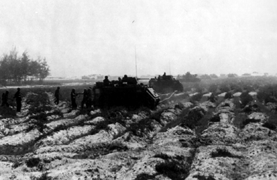 PICTURE - PILE-ON OPERATION IN I CORPS, JUNE 1968. ACAV's and tanks of Troop B, 3d Squadron, 5th Cavalry, attack Binh An.