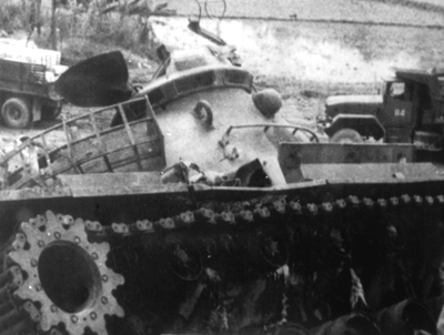 PICTURE - DISABLED M4H OF THE SOUTH VIETNAMESE 20TH TANK REGIMENT. Road wheels received hit from rocket near My Chanh River.