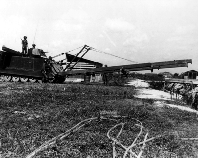 PICTURE - BALK BRIDGE CARRIED BY M113 is demonstrated by troops of South Vietnamese Armor School.