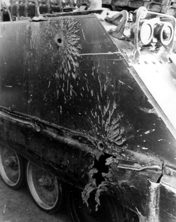 PICTURE - M113 AFTER HITS BY VIET CONG 57-mm. RECOILLESS RIFLE