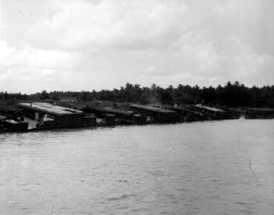 PICTURE - Artillery Fires From Barges Anchored on River Bank