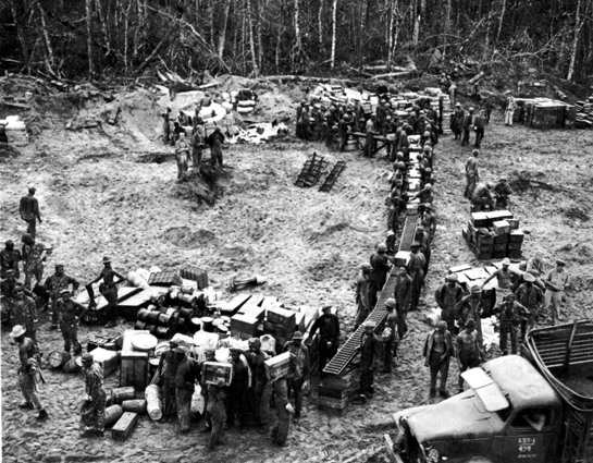 Photo: UNLOADING SUPPLIES ON THE BEACH AT HOLLANDIA