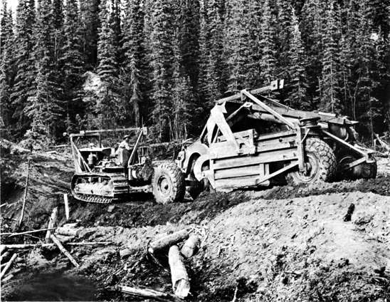Photo: OPERATING HEAVY EQUIPMENT ON THE ALASKA HIGHWAY