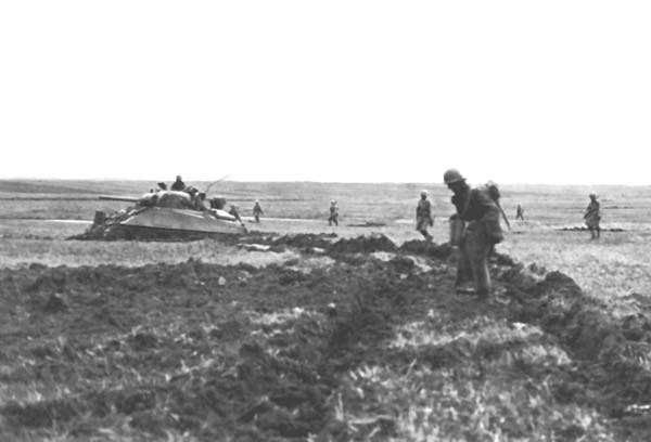 Photograph: Tanks Impeded By Mud slow the advance of the XII Corps left wing.