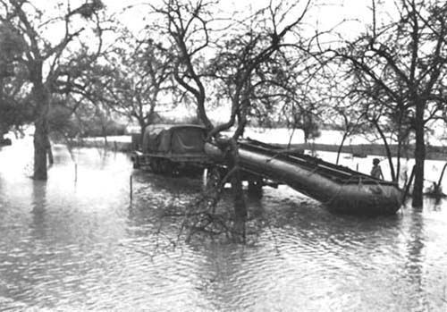 Photograph: Transportation of Bridging Equipment over flooded roads was a difficult problem. 