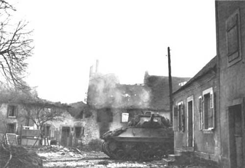 Photograph: Tough fight in Habkirchen was brought to an end on 15 December by tanks and tank destroyers after a three-day struggle by infantry.