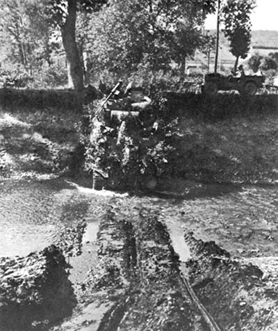 Photograph: Tank Crossing Canal Near Bayon.