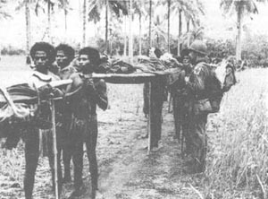 Photo: Native Stretcher Bearers with Wounded American