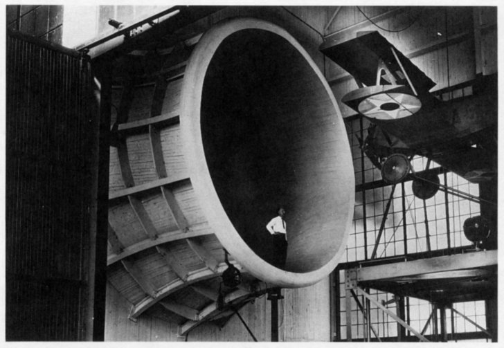 photo of a man standing in the opening of the propeller research tunnel