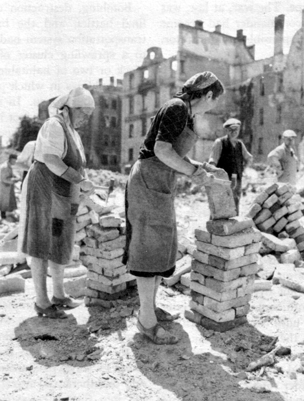 WOMEN SALVAGE BRICKS